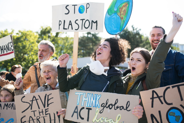 People with placards and posters on a global strike for climate change.