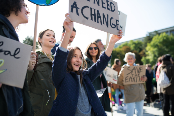 People with placards and posters on a global strike for climate change.