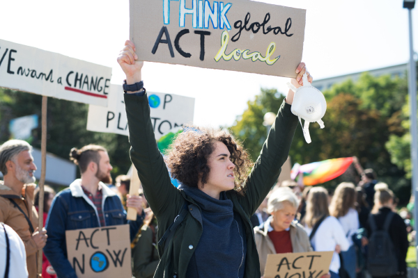 People with placards and posters on a global strike for climate change.