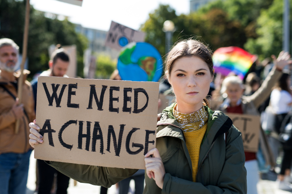 People with placards and posters on a global strike for climate change.