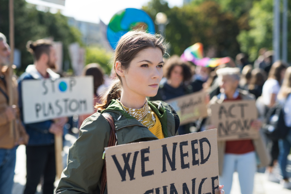 People with placards and posters on a global strike for climate change.