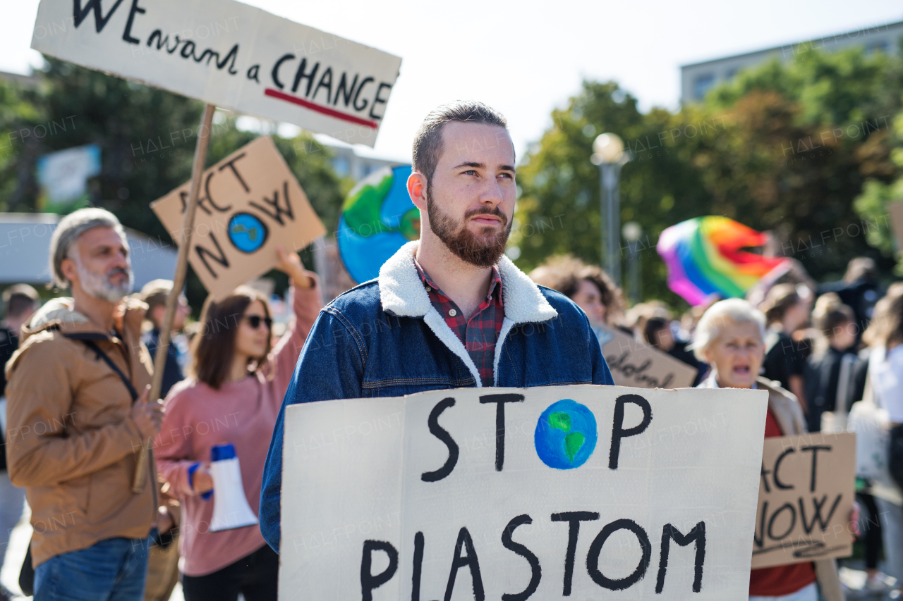 People with placards and posters on a global strike for climate change.