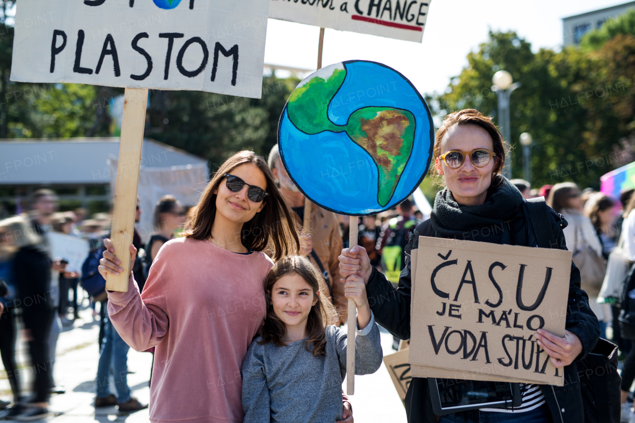 People with placards and posters on a global strike for climate change.