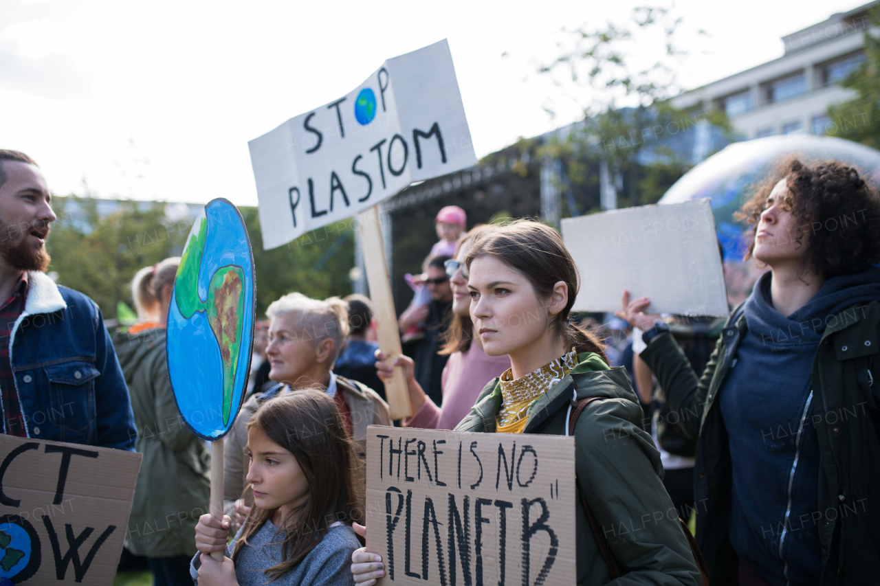 People with placards and posters on a global strike for climate change.