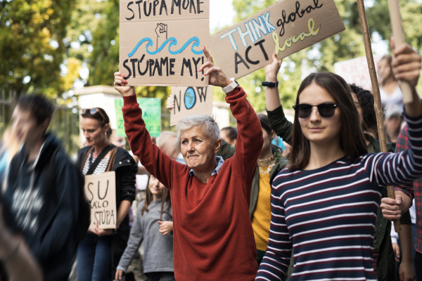 People with placards and posters on a global strike for climate change.