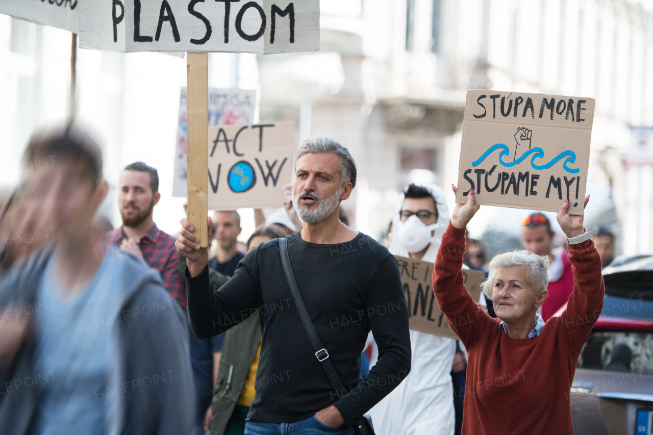 People with placards and posters on a global strike for climate change.