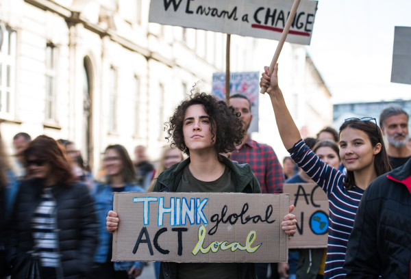 People with placards and posters on a global strike for climate change.