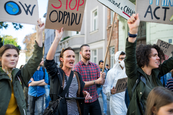 People with placards and posters on a global strike for climate change.