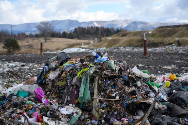 Landfill, large pile of waste. Nature pollution, environmental concept and eco activism.