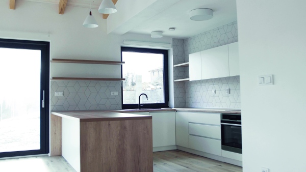 A modern interior of a kitchen in house or flat in new home. A moving in new home concept.