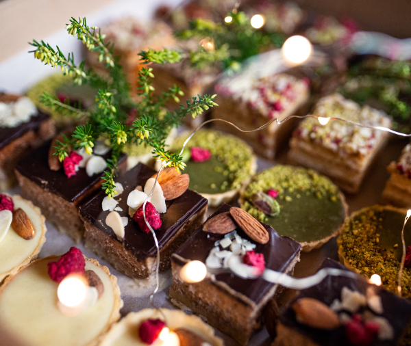 A selection of colorful and delicious cake desserts, close-up