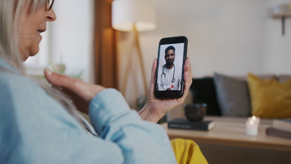 Senior woman having an online consultation with doctor. Lockdown concept.