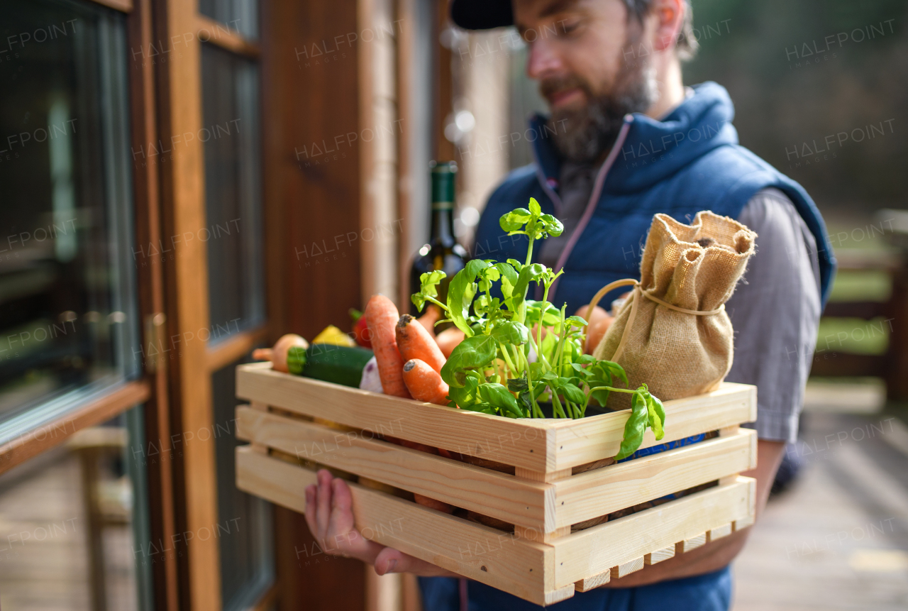 Courier delivering fresh fruit and vegetables groceries shopping, corona virus and quarantine concept.