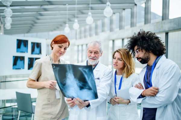 A group of doctors talking about corona virus on conference.