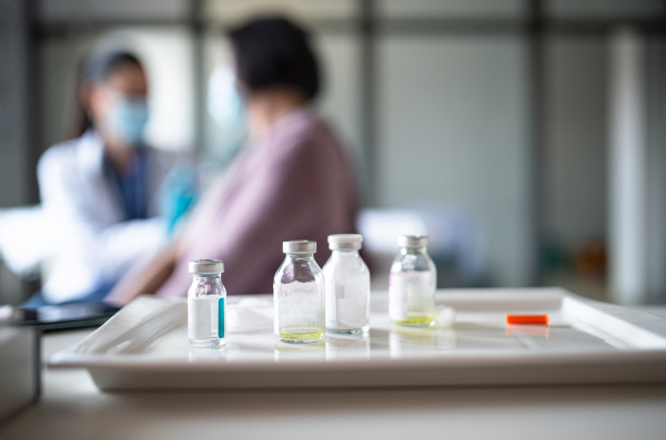 Vials on a tray in hospital, coronavirus and vaccination concept.