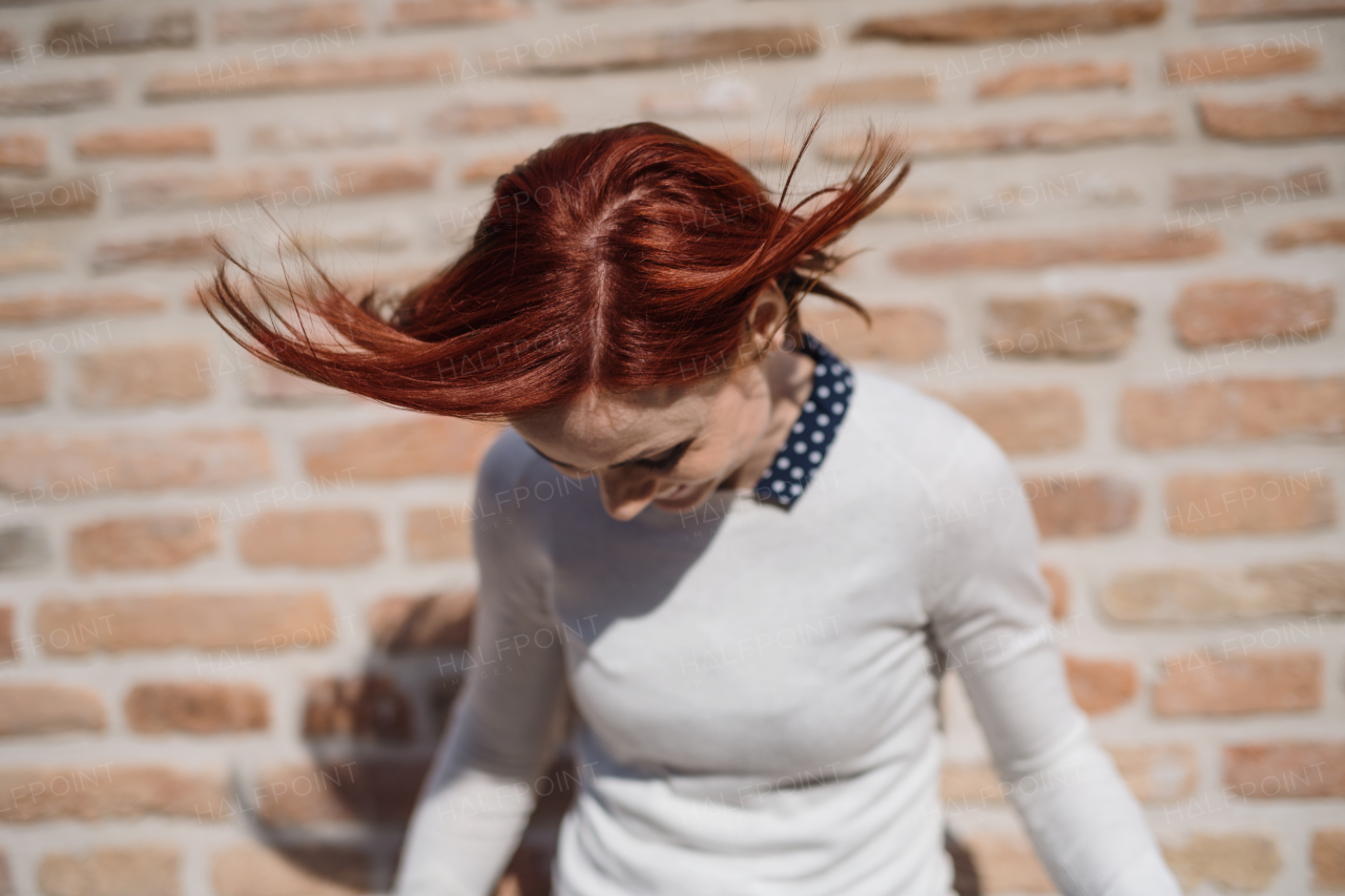 A portrait of young business woman standing outdoors. Copy space. Start-up concept.