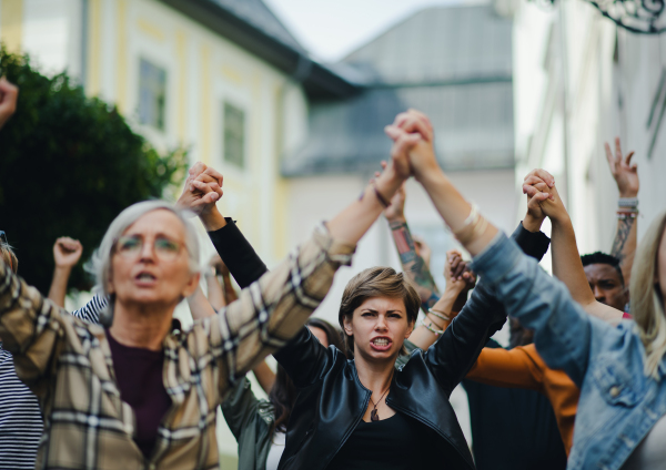 Portrait of group of people activists protesting on streets, women march and demonstration concept.