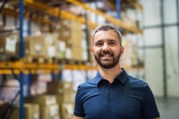 Portrait of a male warehouse worker or a supervisor.