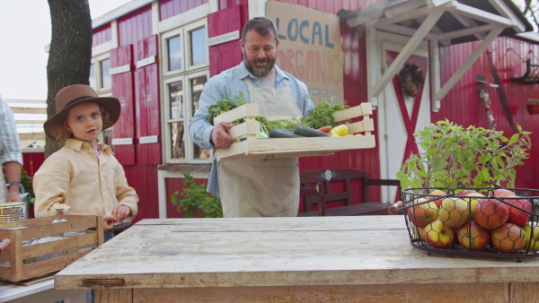 A group of community farmers opening a farm market. Community farming concept.