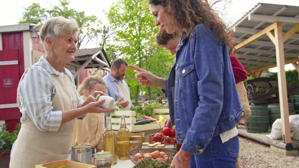 A customers buying fresh products on farm market. Community farming concept.