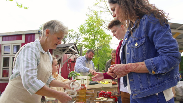 A customers buying fresh herbs and vegetables on farm market. Community farming concept.