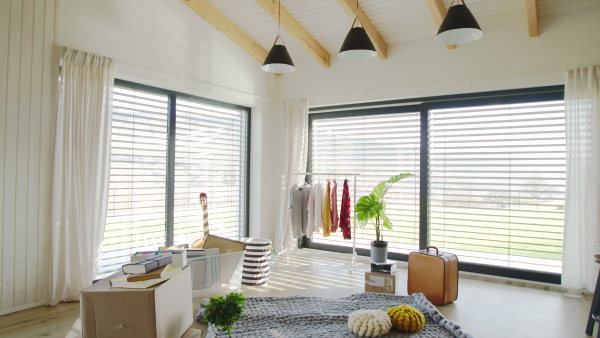 Interior of room with boxes, moving in new home house concept.