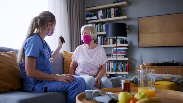 Portrait of senior woman having a consultaion with personal trainer.