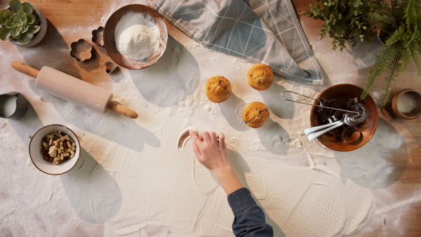 A flat lay top view of baking ingredients, impact of coronavirus on small business concept.