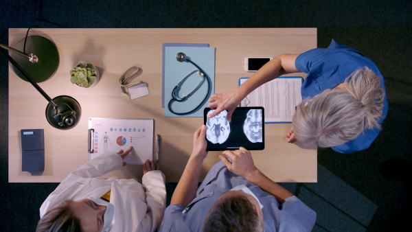 Top view of unrecognizable medical workers getting ready for work.