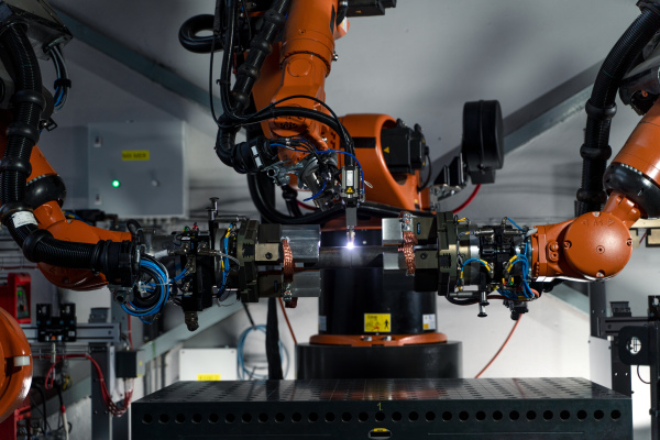 A robotic arm at industrial manufacture factory. Automated production cell.