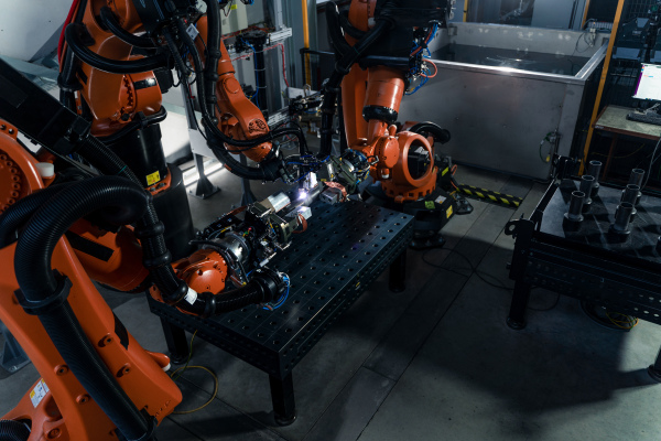 A robotic arm at industrial manufacture factory. Automated production cell.