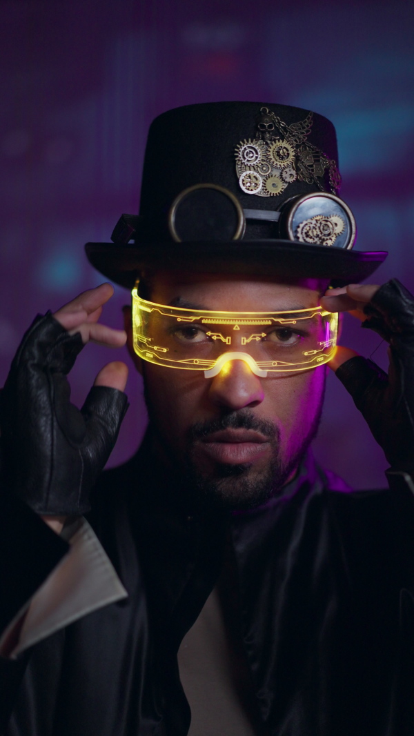 An African american man in metaverse digital cyber environment with smart glasses and steam punk accessories