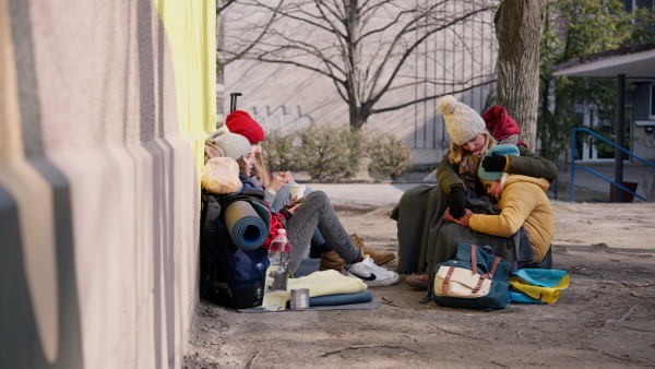 The Ukrainian immigrants crossing border and sitting and waiting for registration.