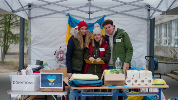 The team of volunteers distributing food, drinks and other donations to refugees on the Ukrainian border.