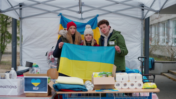 The team of volunteers distributing food, drinks and other donations to refugees on the Ukrainian border.