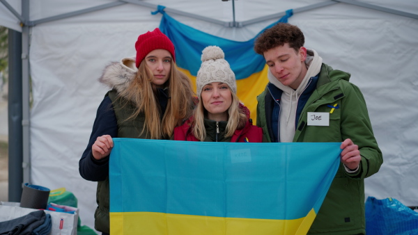 The team of volunteers distributing food, drinks and other donations to refugees on the Ukrainian border.