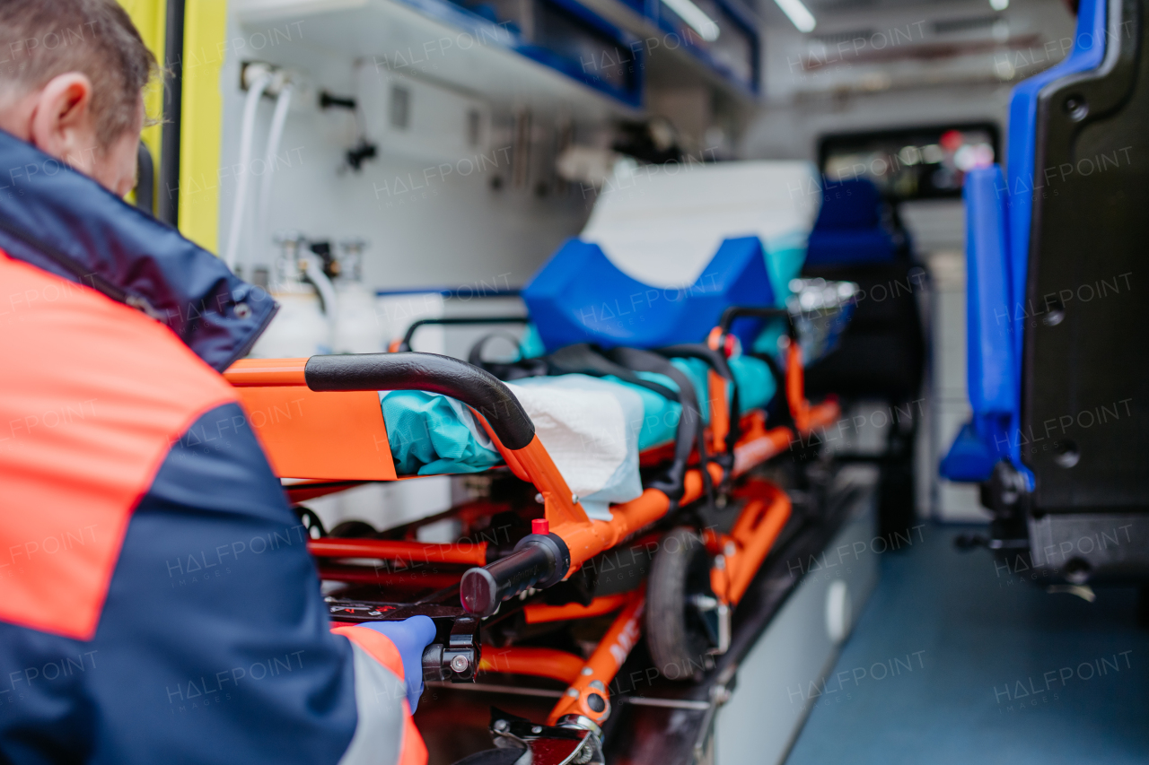 Close-up of empty stretcher inside of the ambulance car.