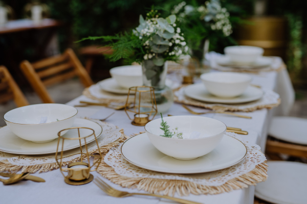 High angle view of aesthehic setting wedding table with the flowers at backyard.