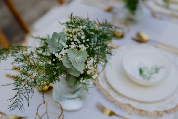 High angle view of aesthehic setting wedding table with the flowers at backyard.