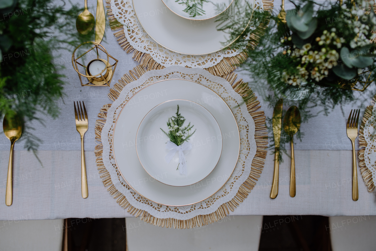 High angle view of aesthehic setting wedding table with the flowers at backyard.