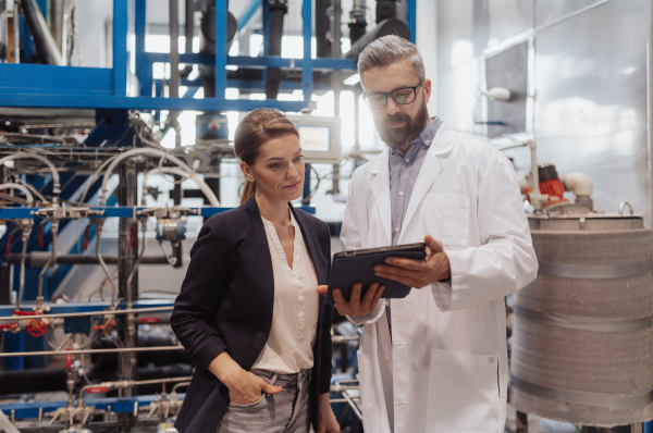 Engineering managers doing routine check up in industrial factory