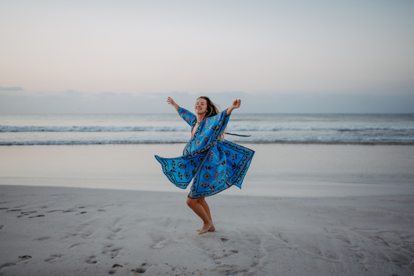 Young woman enjoying time at the sea.