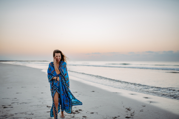 Young woman enjoying time at the sea.