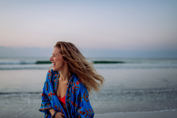 Young woman enjoying time at the sea.