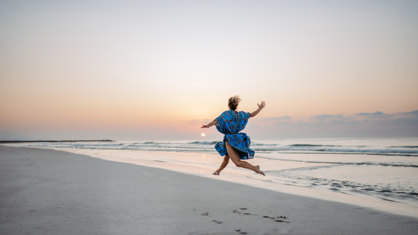 Young woman enjoying time at the sea.