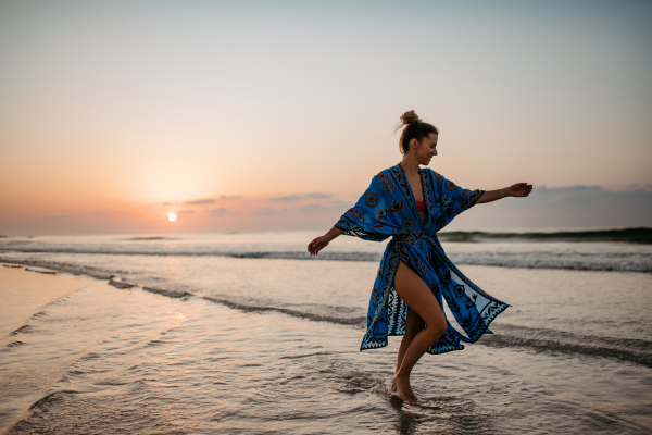 Young woman enjoying time at the sea.