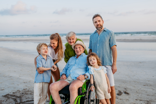 Portrait of multi generations family with kids at sea in exotic country.