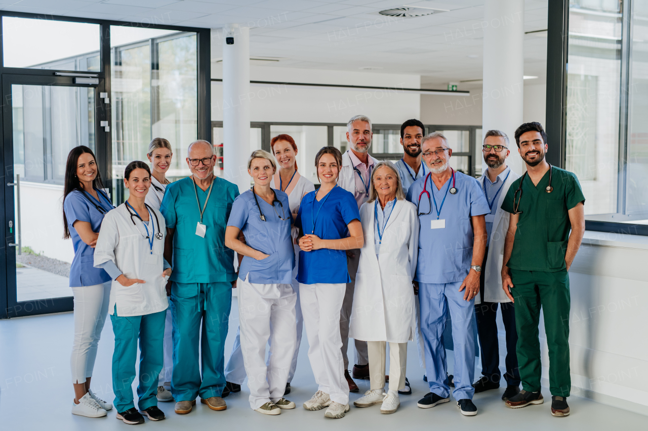 Portrait of happy doctors, nurses and other medical staff in a hospital.