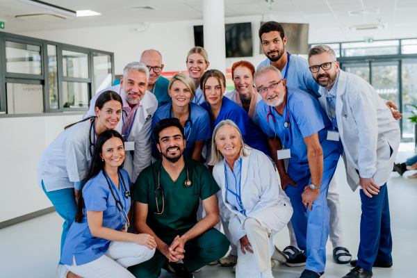 Portrait of happy doctors, nurses and other medical staff in a hospital.