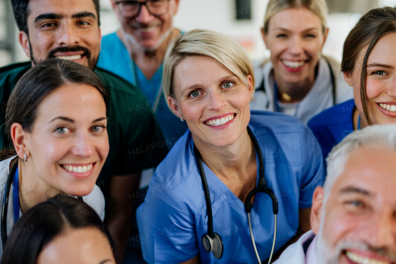 Portrait of happy doctors, nurses and other medical staff in a hospital.